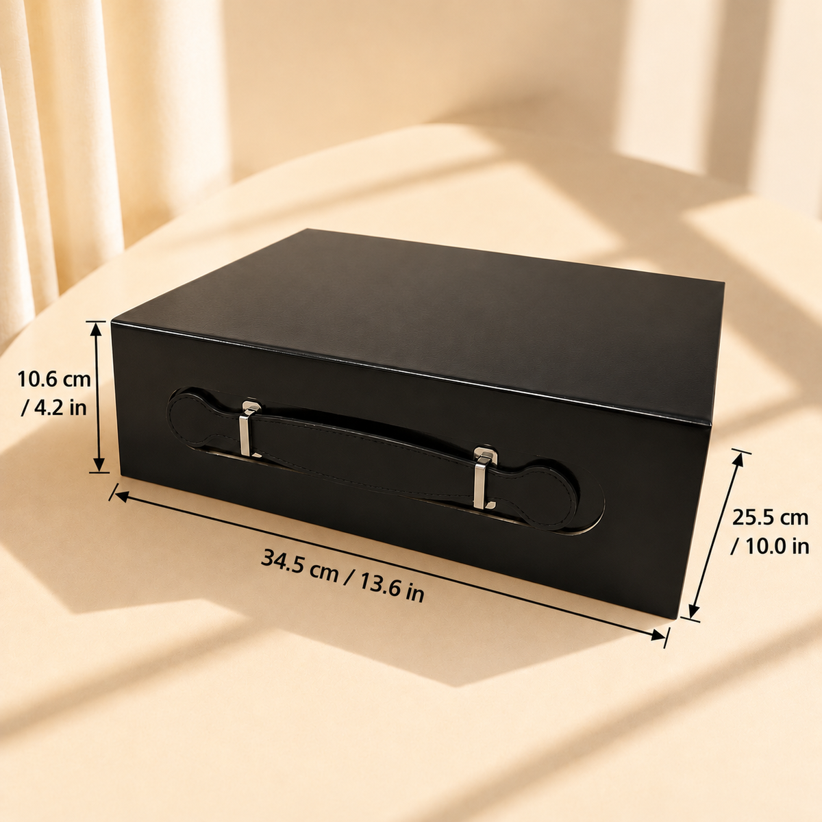 Black medium magnetic folding gift box with handle and exterior dimensions of 34.5 x 25.5 x 10.6 cm.